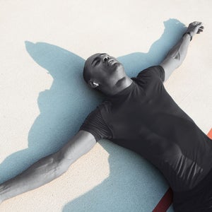 person on the floor tired after a workout