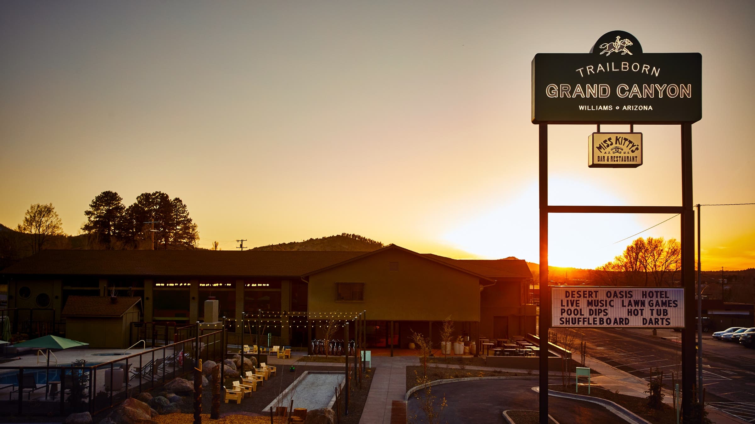 Trailborn Grand Canyon hotel and marquee at sunset.