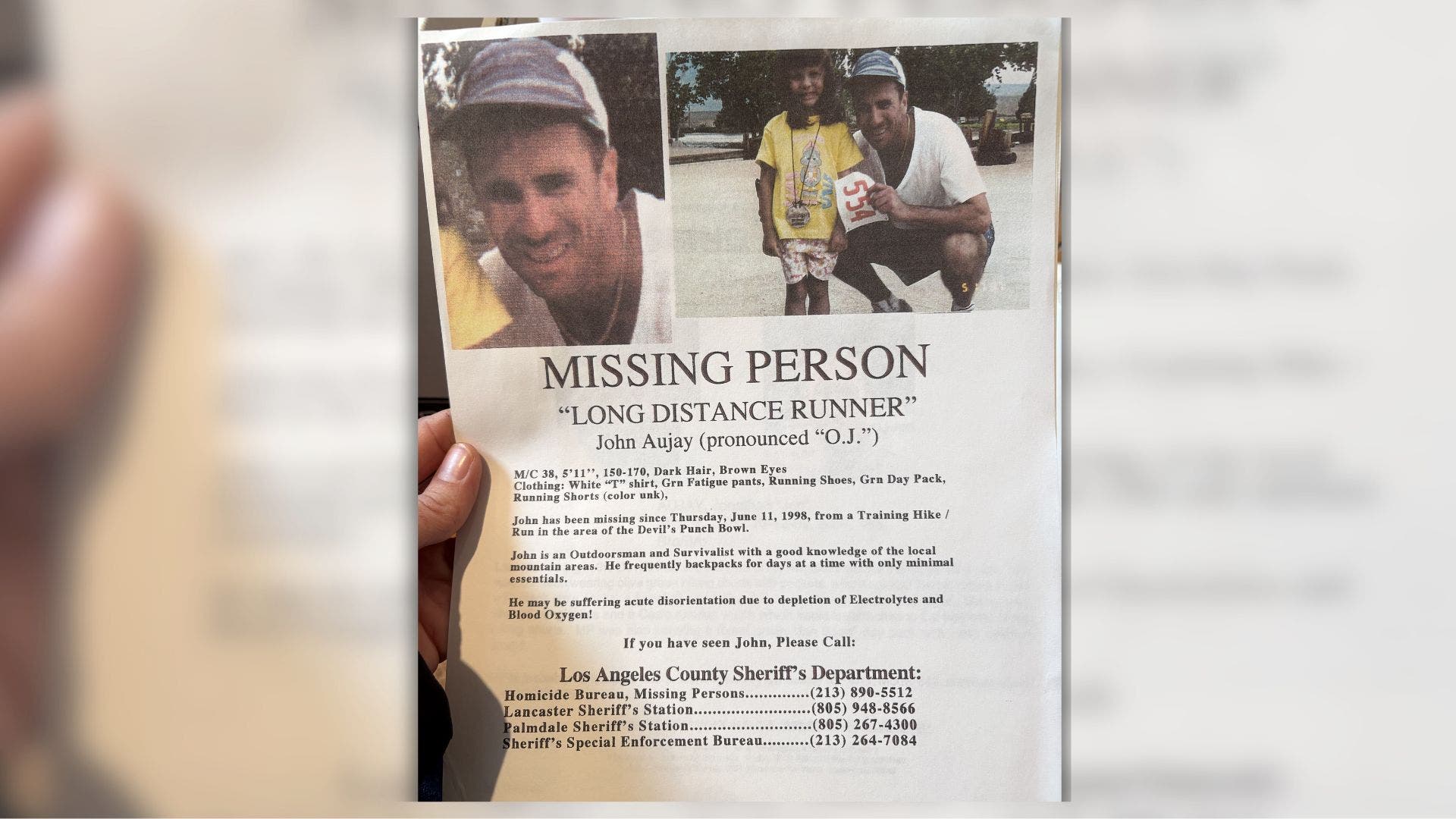 A copy of Aujay's 1998 missin person poster
