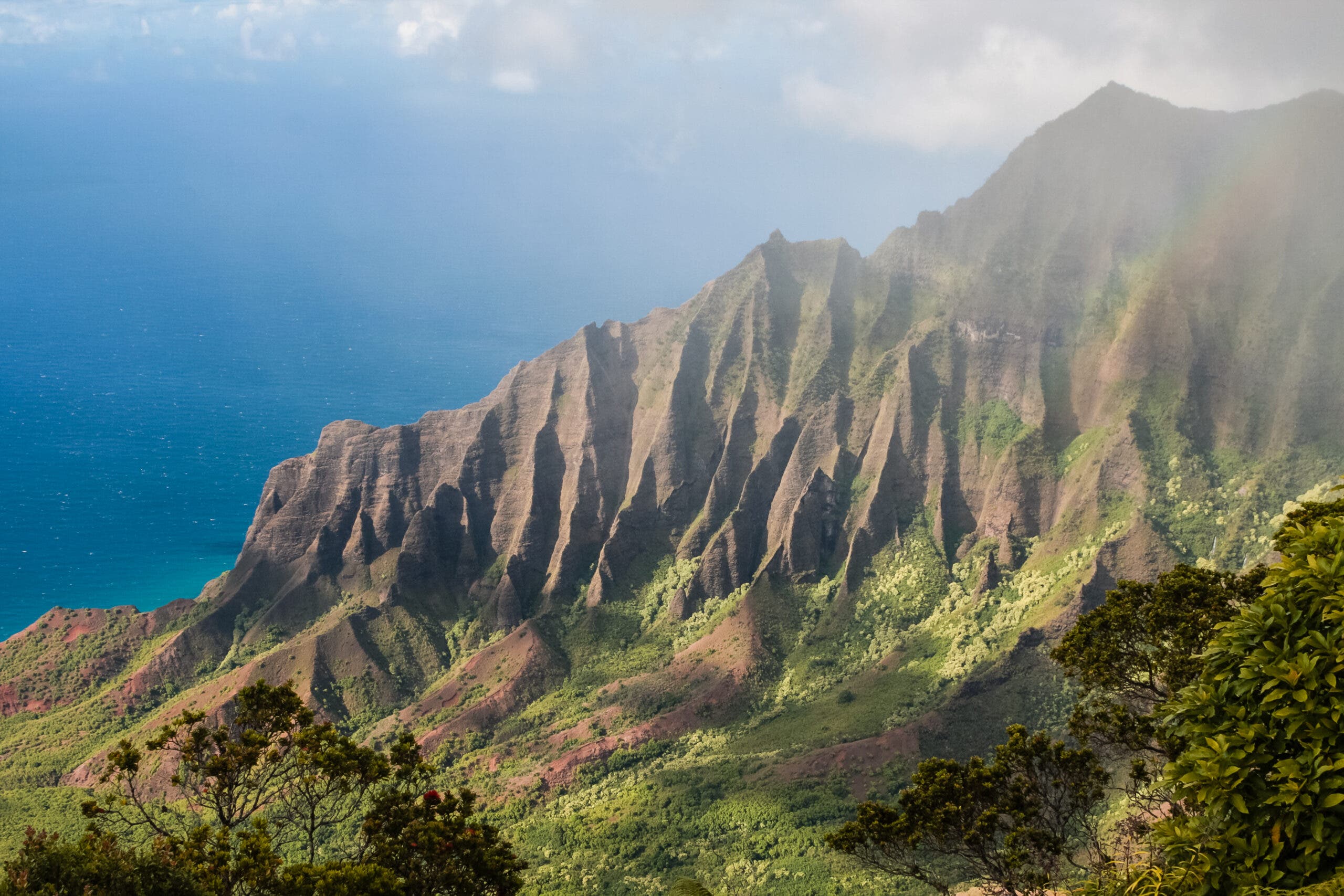 The serrated emerald ridges of the Na Pali Coast in Kauai, Hawai, United States