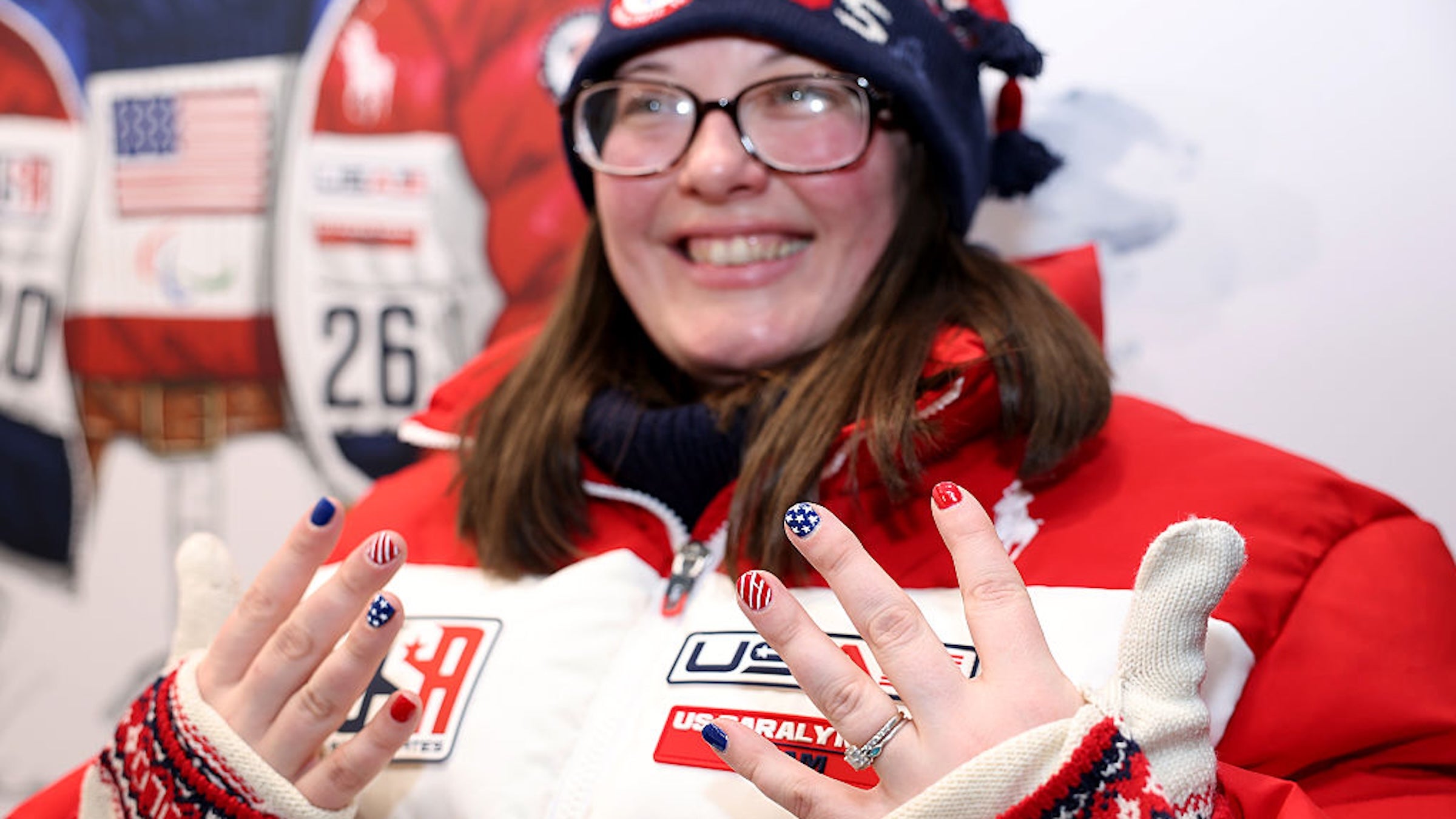 Wheelchair Curling athlete Katie Verderber shows off her Paralympic pained nails