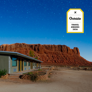 collage of two photos, one of the interior of trailborn grand canyon and one of the exterior of marble canyon lodge, overlayed with a Outside Travel Awards 2026 logo.