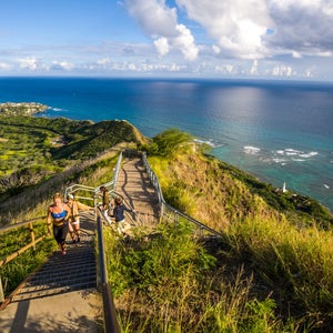 People running the Trail to Diamond Head Crater, Oahu, Hawaii, one of the most scenic running trails in the U.S.