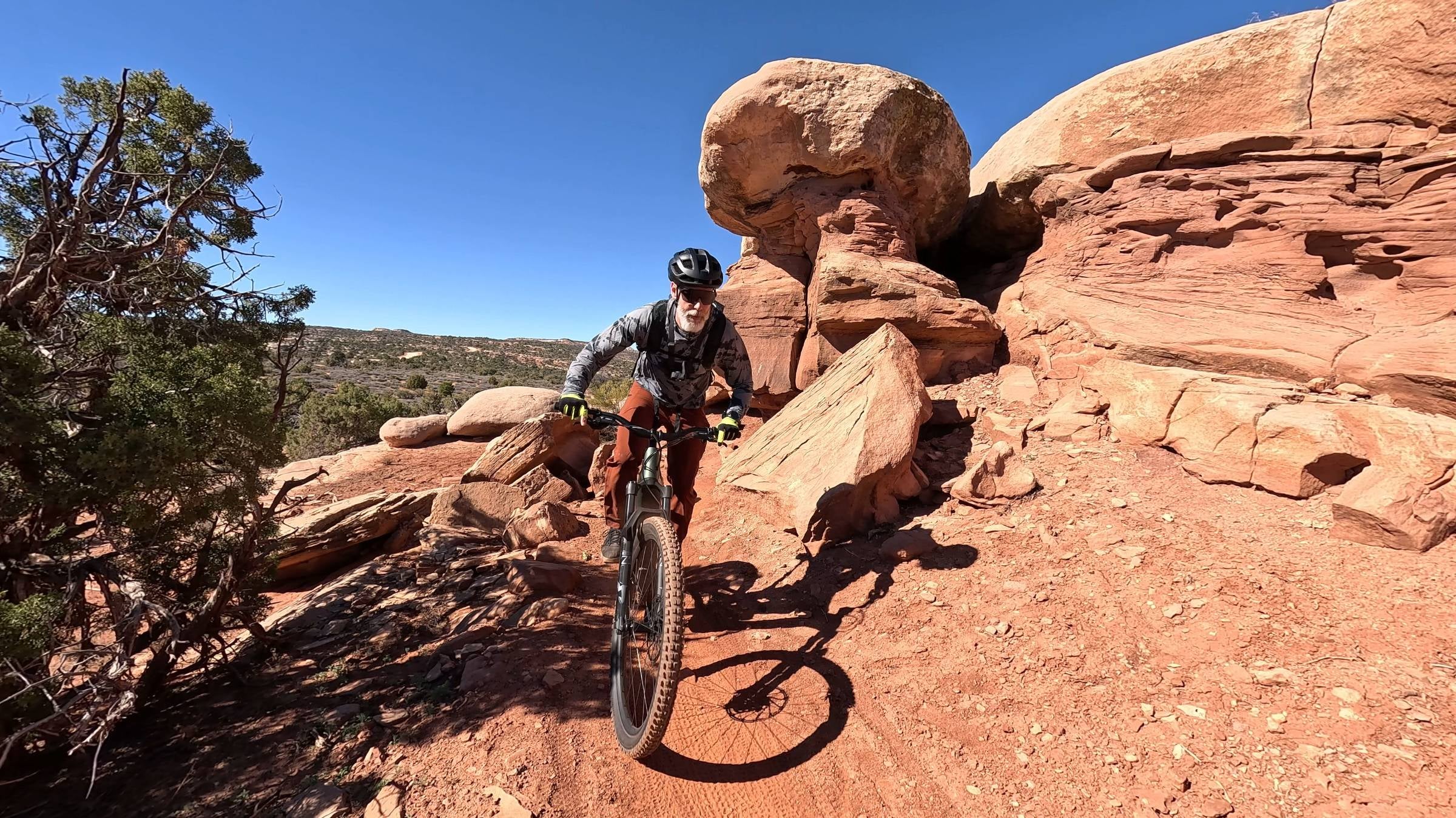 Graham Averill rides an e-bike on Getaway Trail's singletrack in Moab.