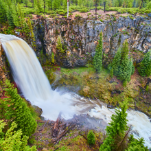 Tumalo Falls in Oregon rushing through pine forests
