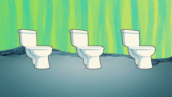 three toilet bowls on a blue and green water background