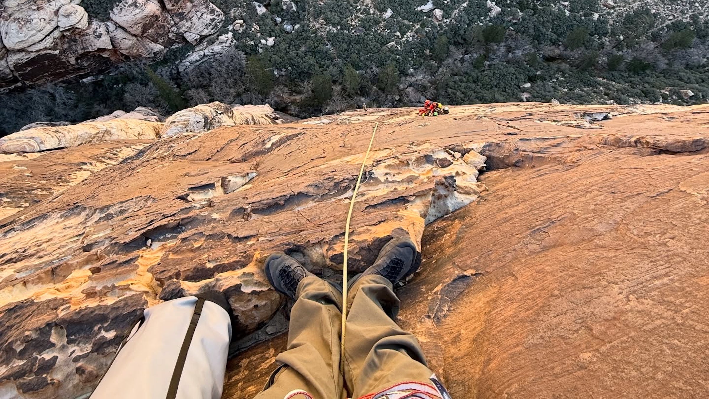 The climber landed on a pitch 600 feet above the ground
