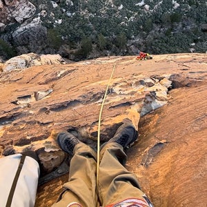 The climber landed on a pitch 600 feet above the ground