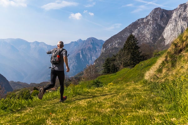 man running in mountains