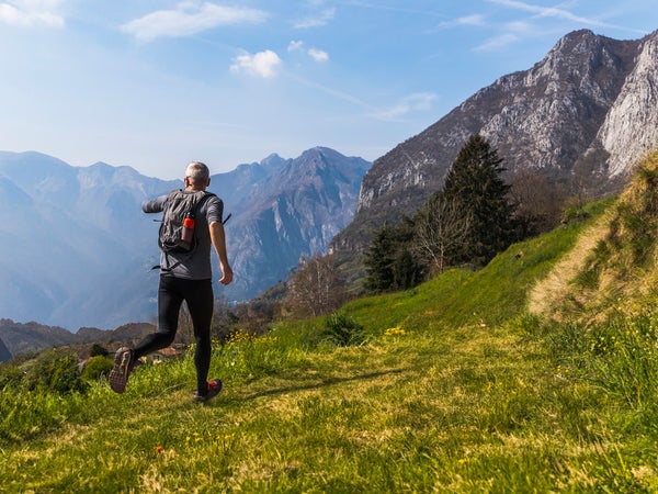 man running in mountains