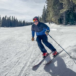 Jakob Schiller rides down the hill in Patagonia’s Nano-Air Ultralight Freeride Jacket