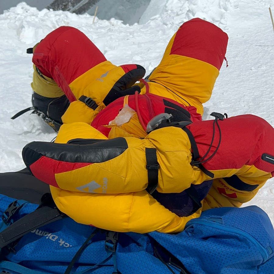 A climber awaits rescue on a peak