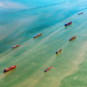 Large group of oil tankers entering Galveston Bay in Texas from the Gulf of Mexico