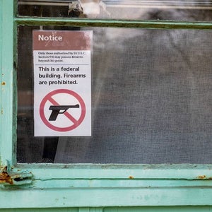 guns are currently prohibited by law at national park service federal buildings