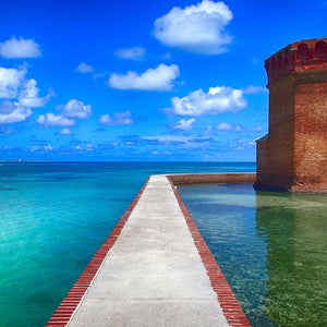 the walls of fort jefferson shown against the turquoise atlantic waters of dry tortugas national park