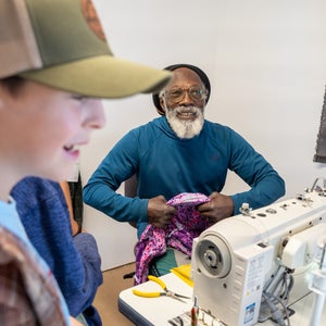 Phil Henderson repairing gear