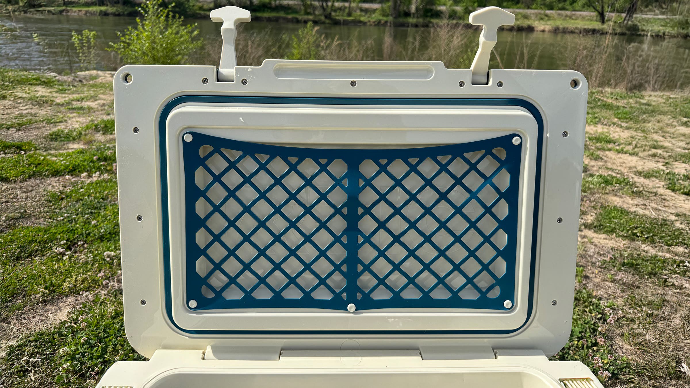 The silicone stash net pocket inside the RTIC Ultralight Wheeled Cooler