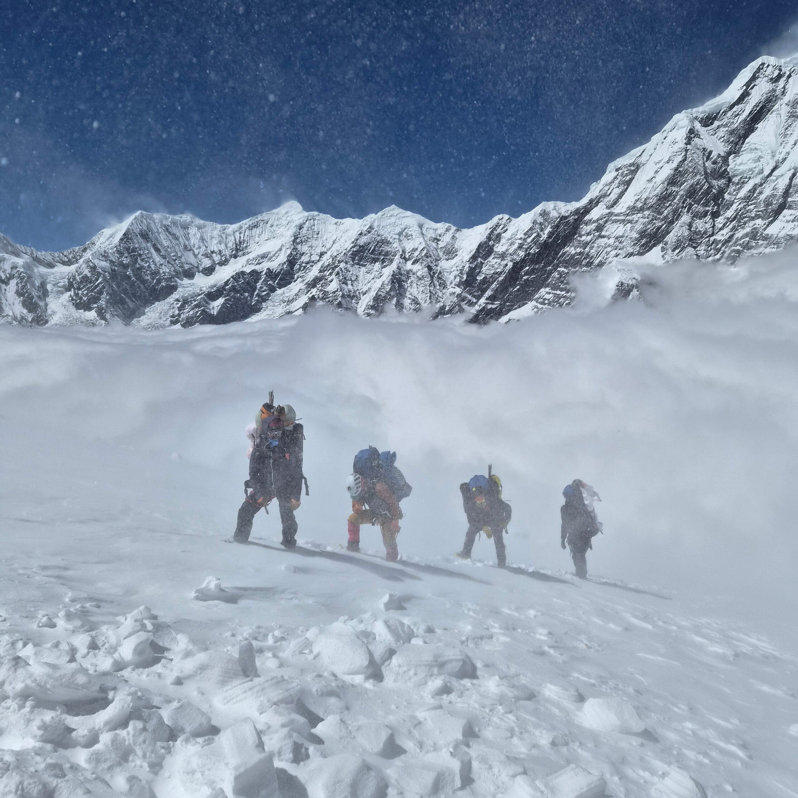 Blowing snow engulfs climbers on Annapurna 