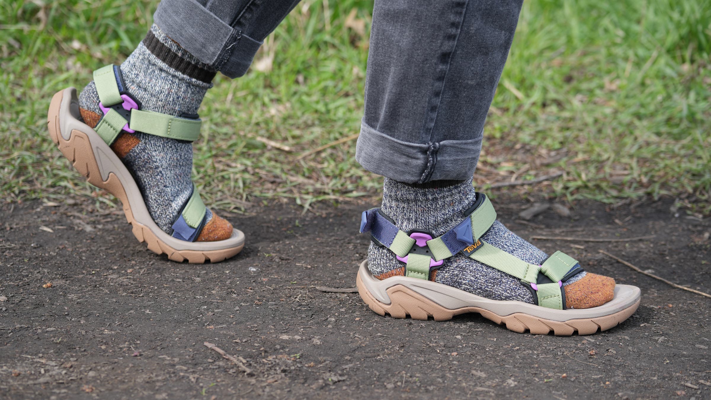 Hiker wearing Teva Terra Fi 5 hiking sandals on a bird watching adventure, an essential piece of the best birding gear
