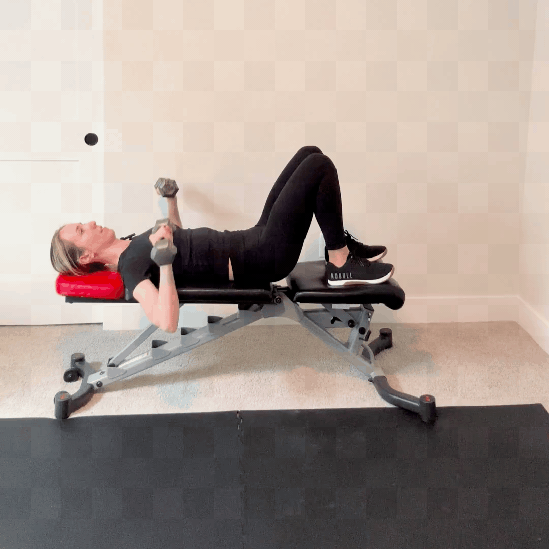 person doing a dumbbell press
