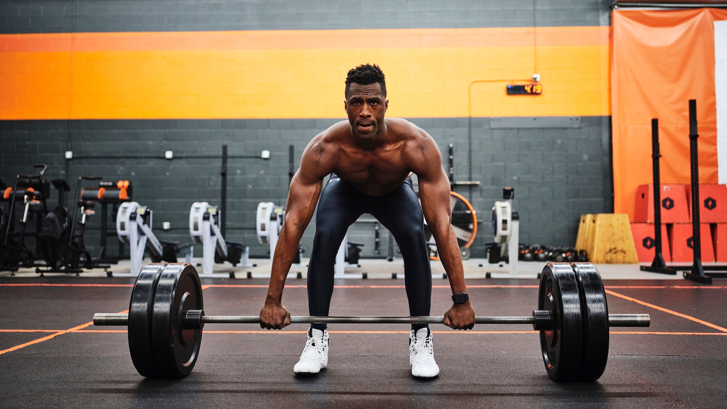 man in gym preparing to lift
