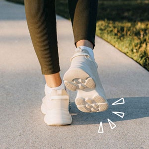 person doing a walking workout outside