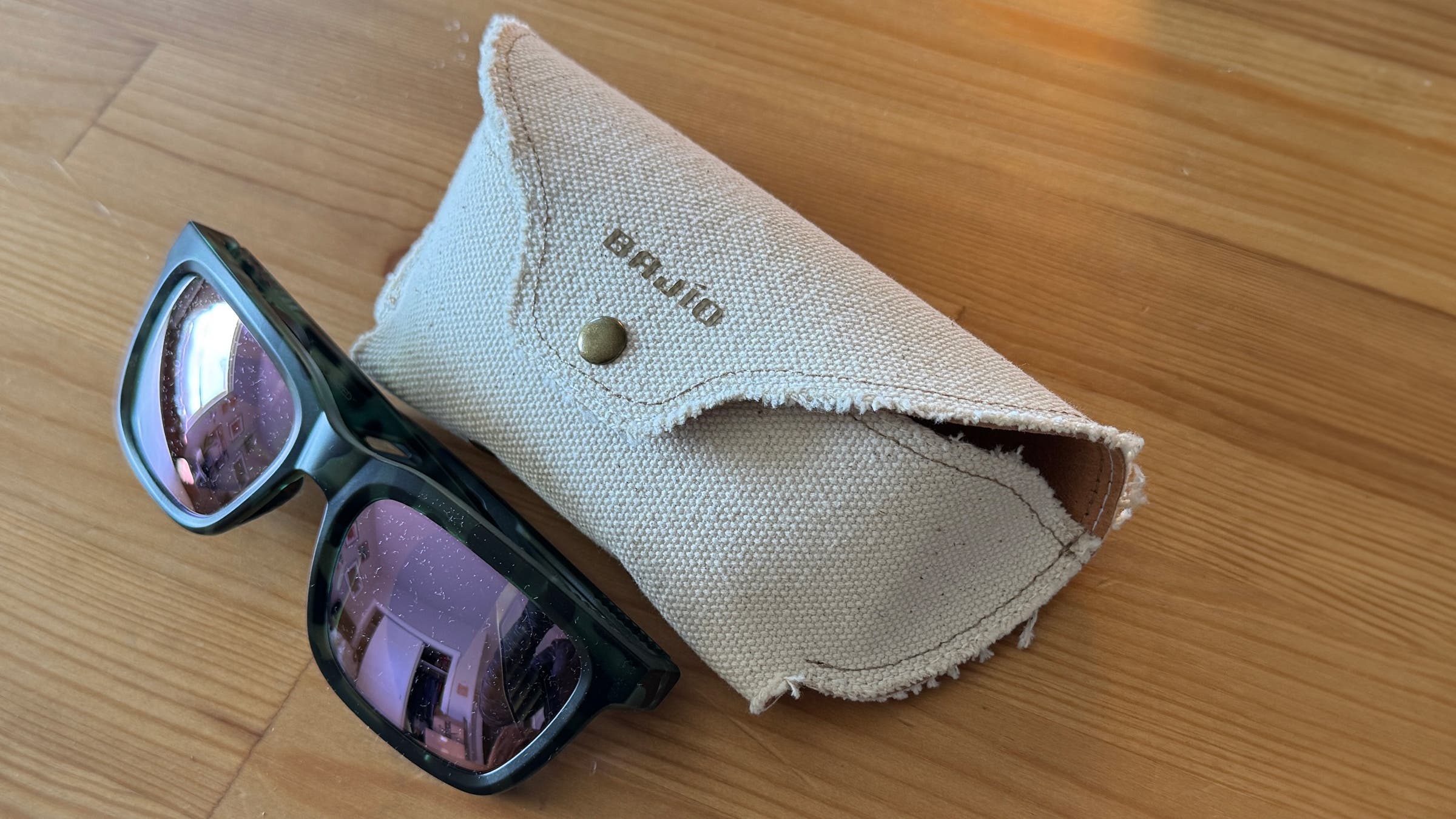 Tester image of Bajío Palehorse sunglasses on hardwood floor