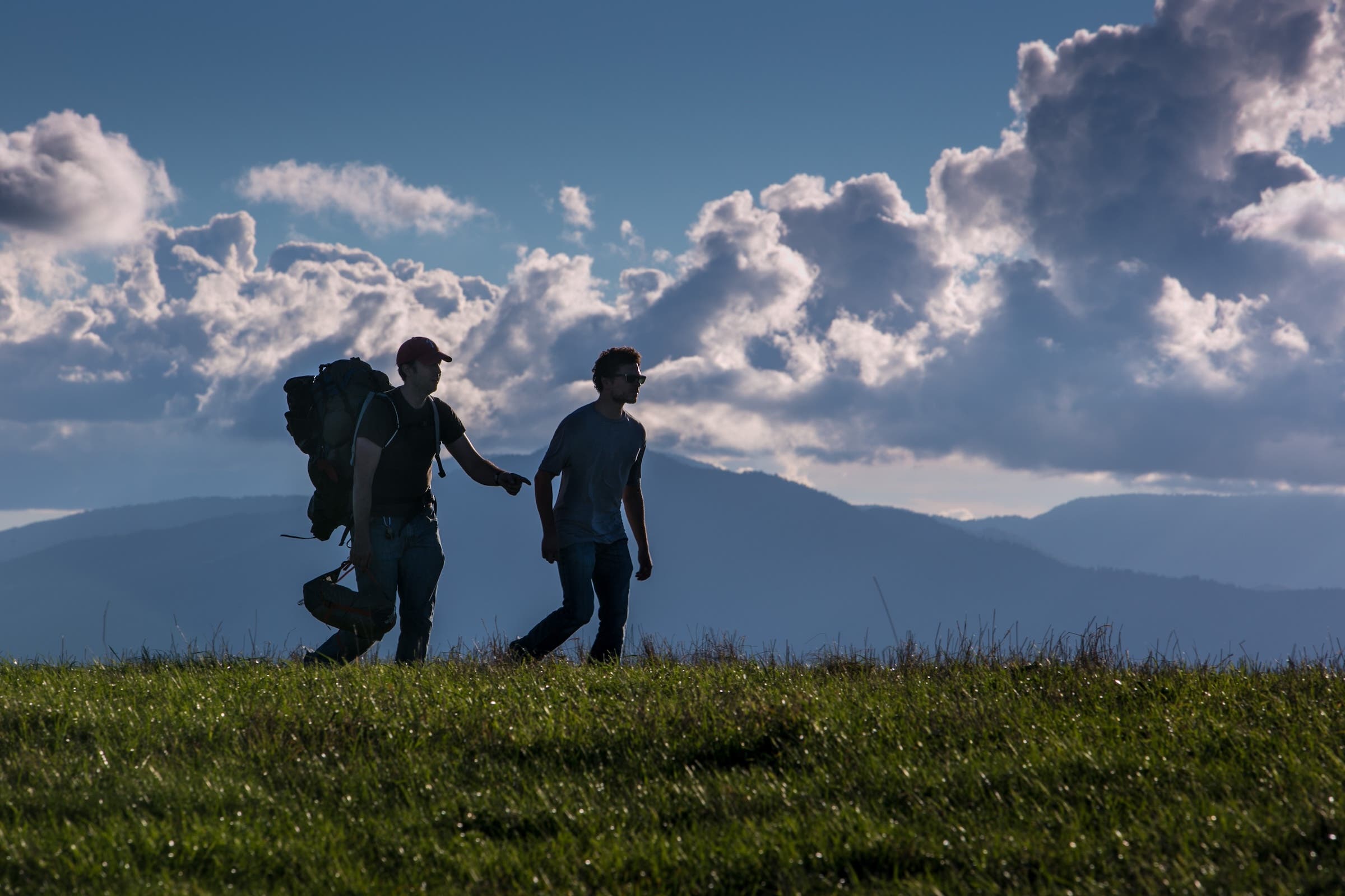 The evening sky and distant Tennessee horizon is viewed from Max Patch, a bald mountain that is a favorite camping spot for those hiking the Appalachian Trail, near Hot Springs, North Carolina