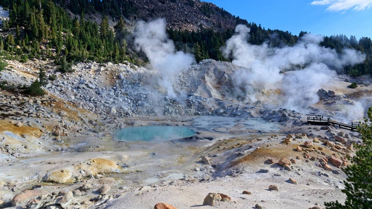 Landscape view of the geothermal features of Bumpass Hell in Lassen Volcanic National Park.