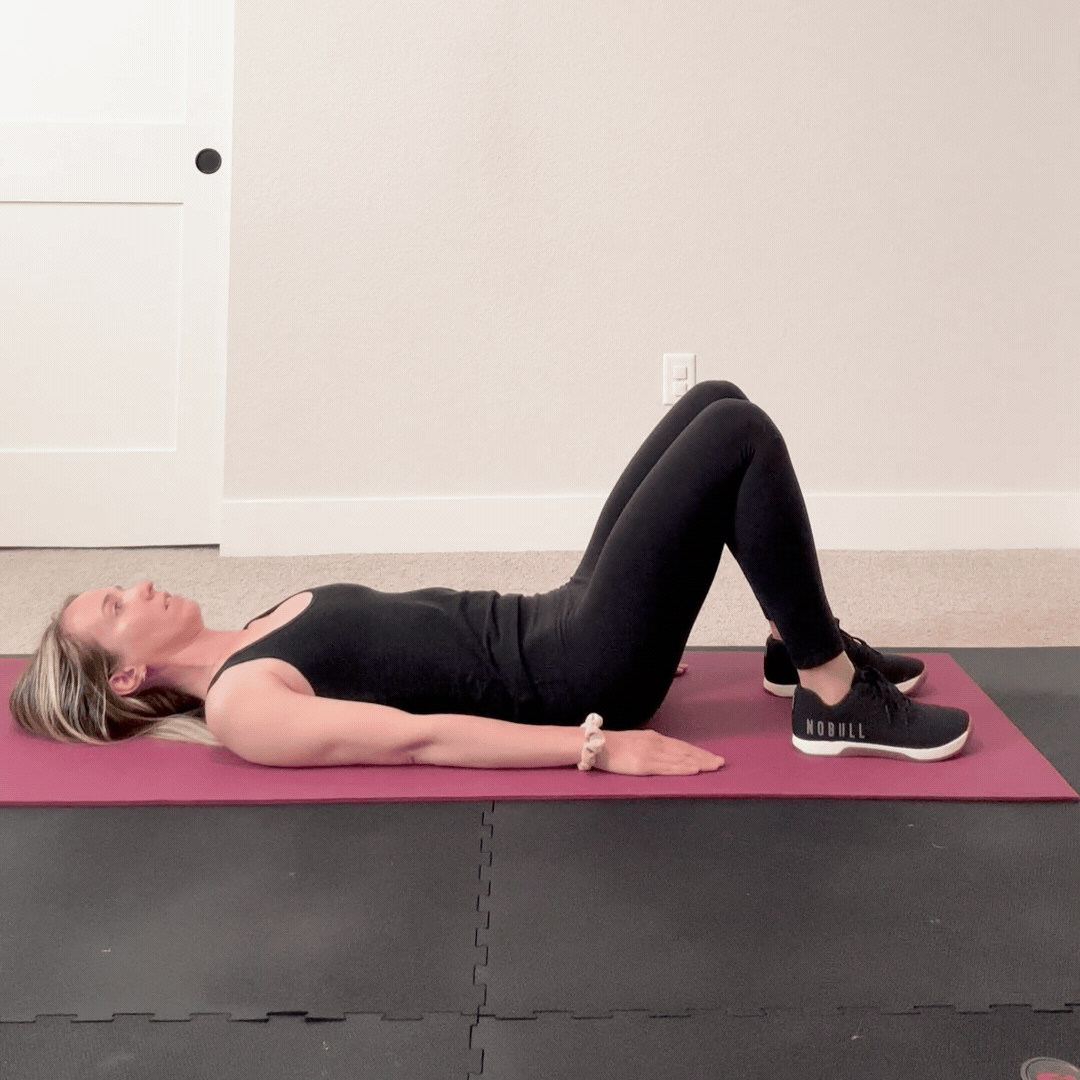 person doing a glute bridge exercise