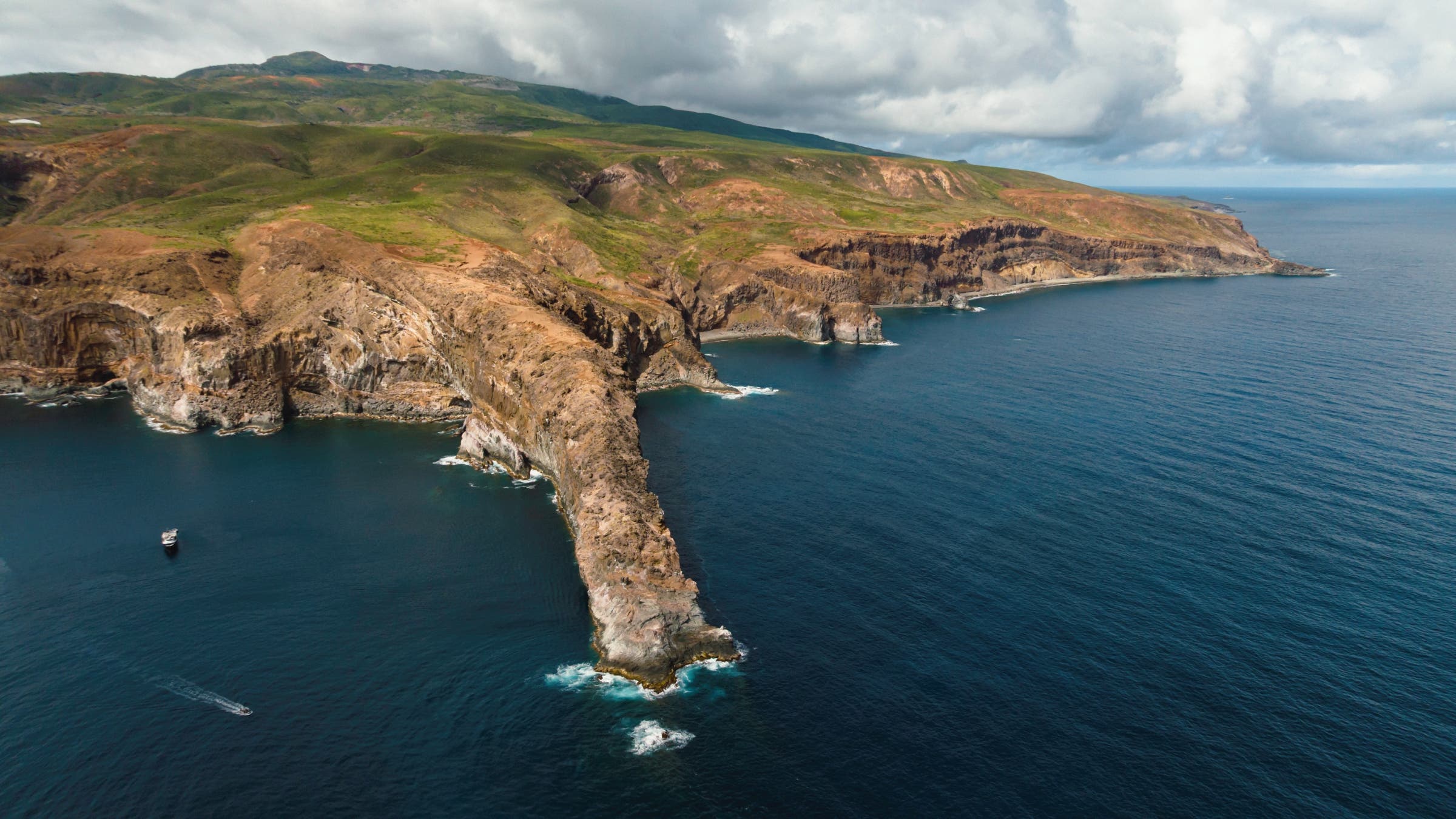 Aerial shot of a large ocean island.