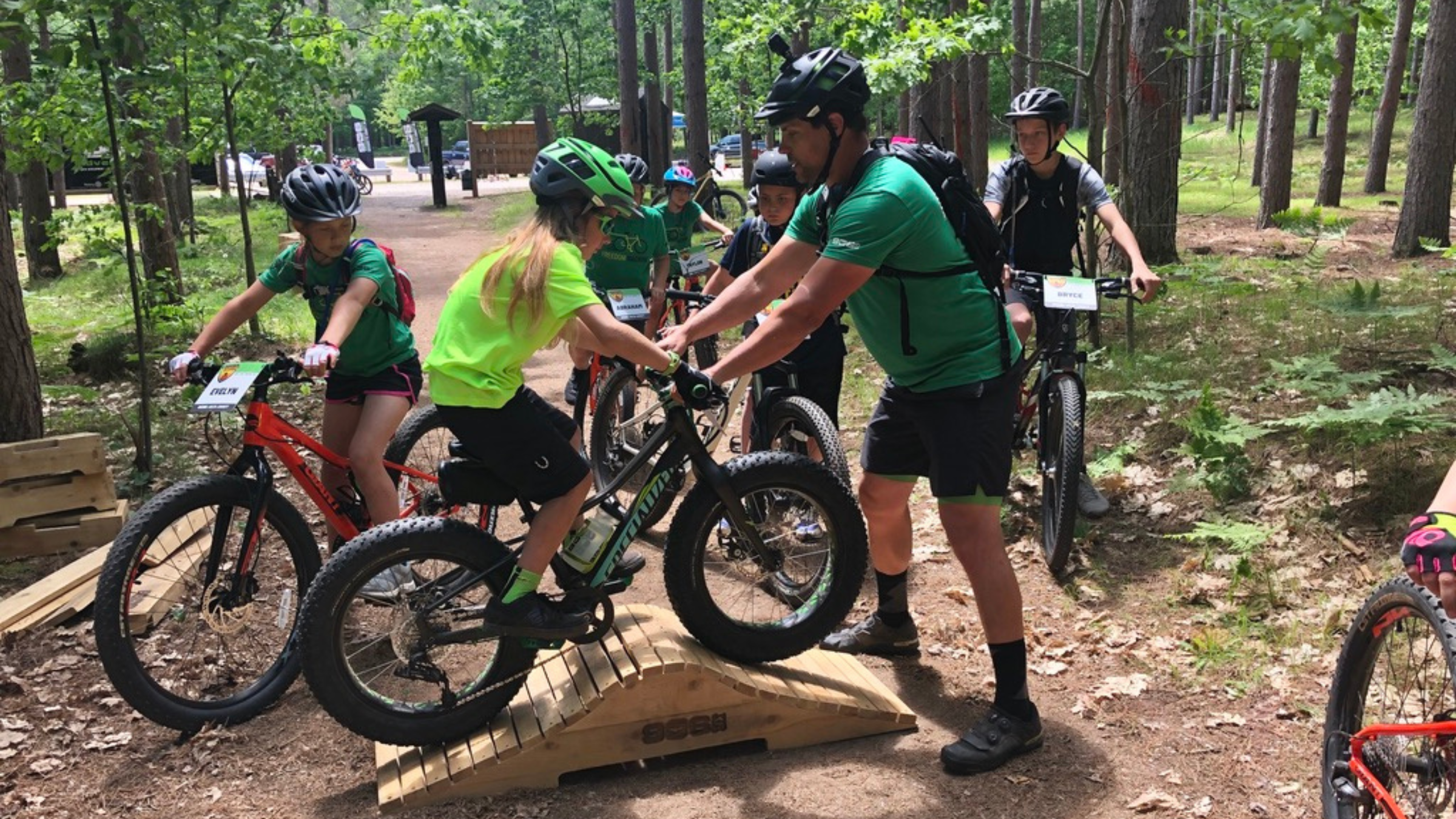Todd Poquette pictured teaching 906 Adventure Club members how to face obstacles on the track