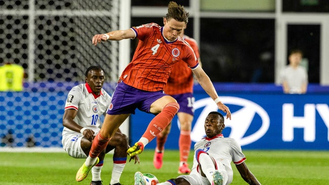 - JUNE 13: Scotland's Scott McTominay and Danley Jean Jacques of Haiti in action during a 2026 FIFA World Cup Group C match between Haiti and Scotland at the Boston Stadium, on June 13, 2026, in Foxborough, United States.