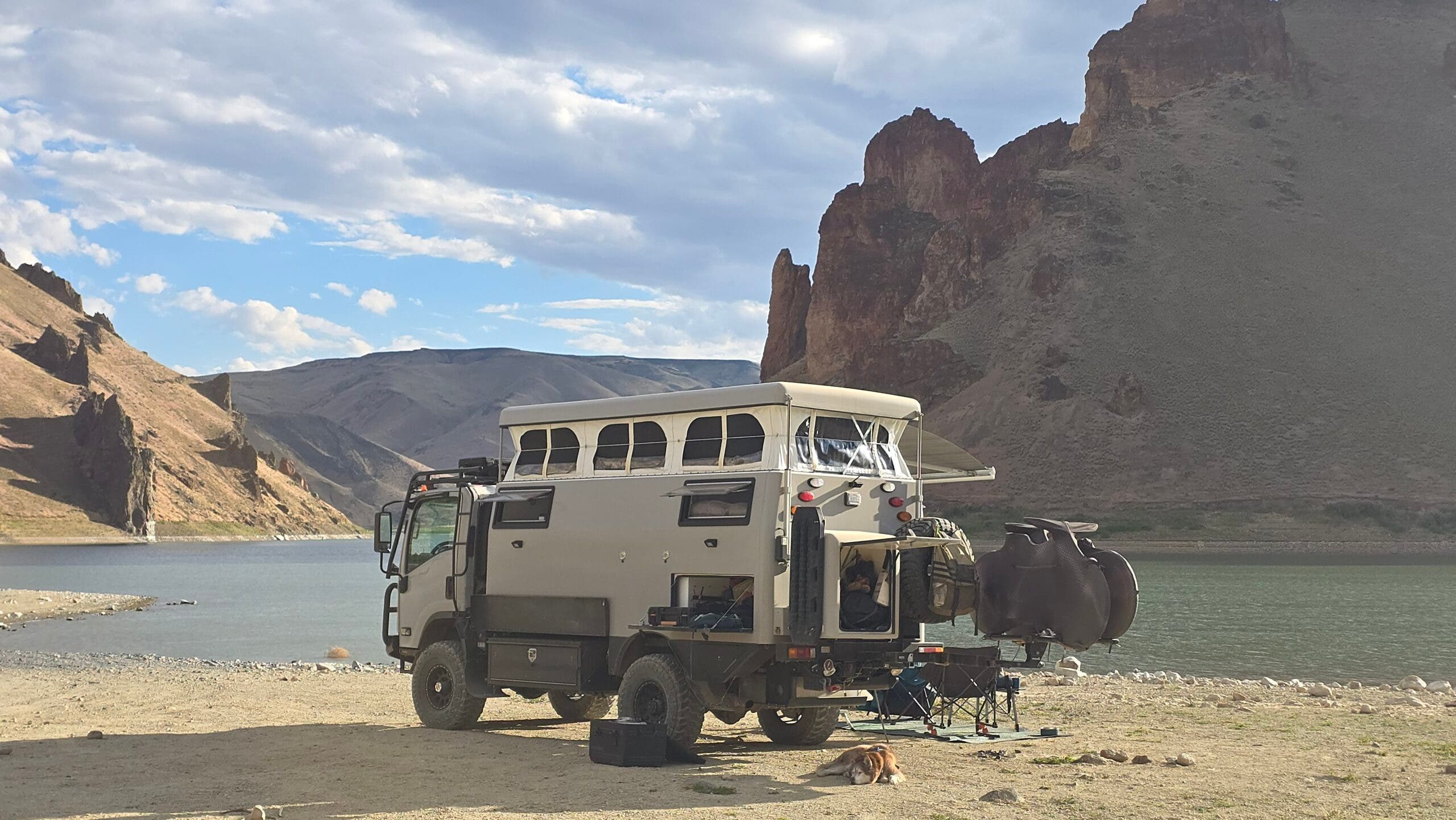 A large tank-style overlanding truck built out with modern amenities for the backcountry