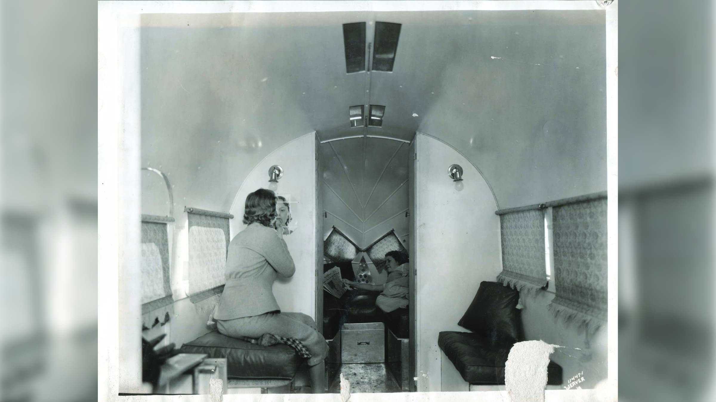 Old photograph of the inside of an Airstream.