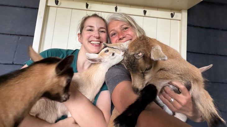The author and farm owner Ellen Beaulieu with goats