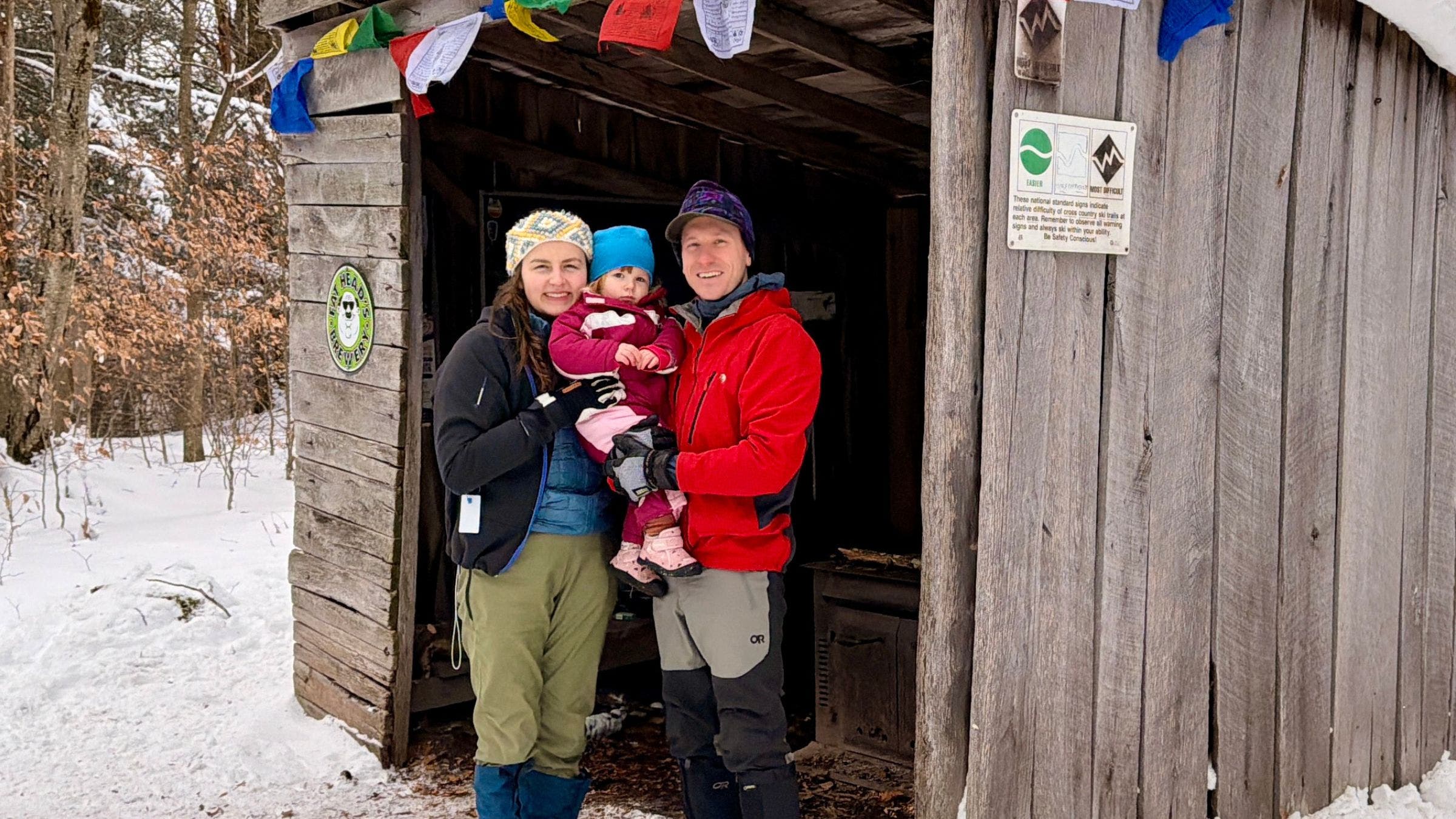 Corey Lilly and his wife and daughter