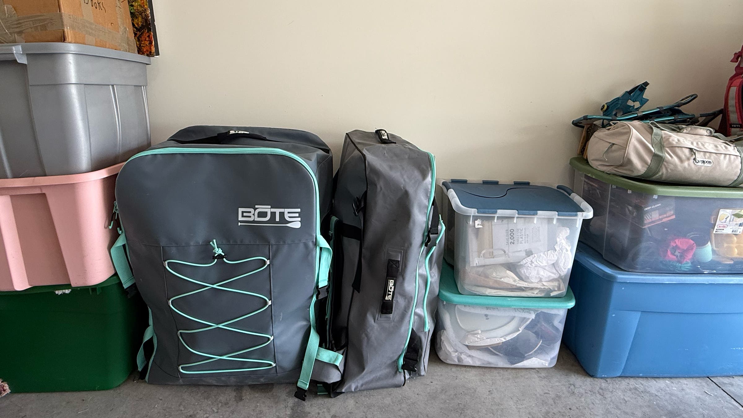 Bote Argo Aero packed in bag in storage area of garage