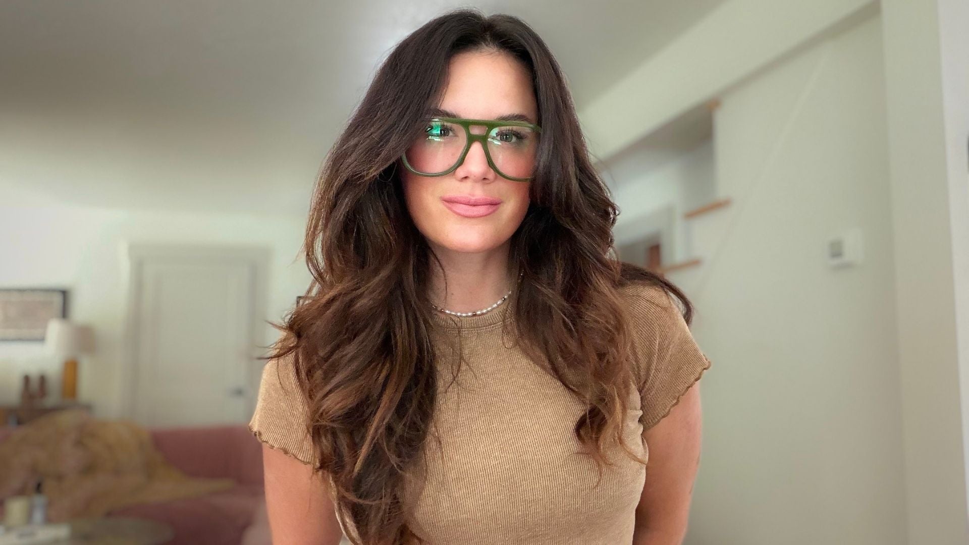 outside associate editor wearing the jeremy jones x caddis blue light glasses