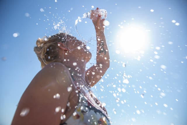 4 Signs You're a Salty Sweater and How to Hydrate Effectively, According to a Sports Dietitian