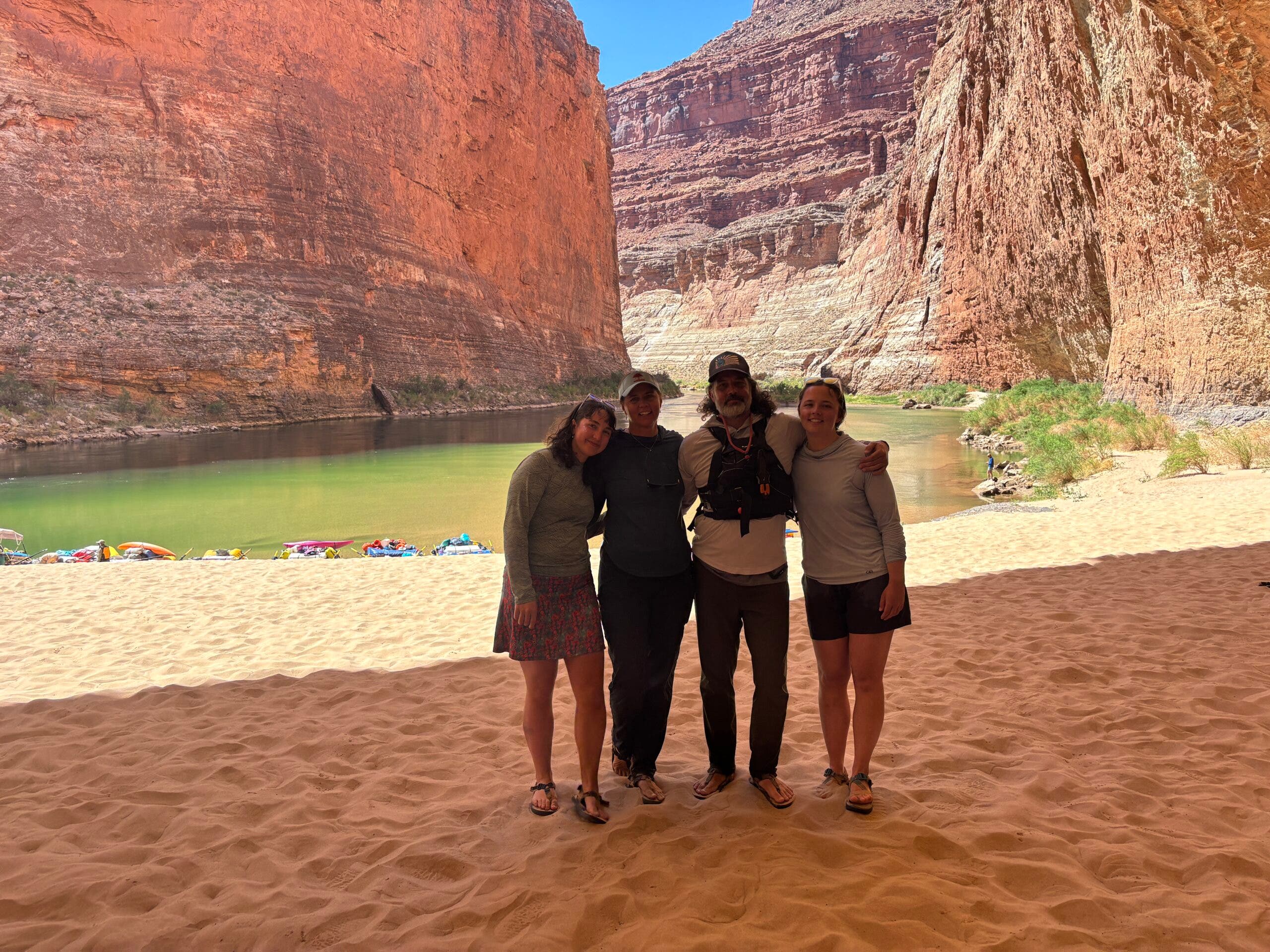 Matthew Wappett with his wife and two daughters at Redwall Cavern along the Colorado River