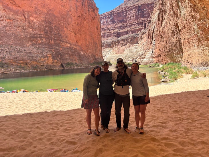 Matthew Wappett with his wife and two daughters at Redwall Cavern along the Colorado River