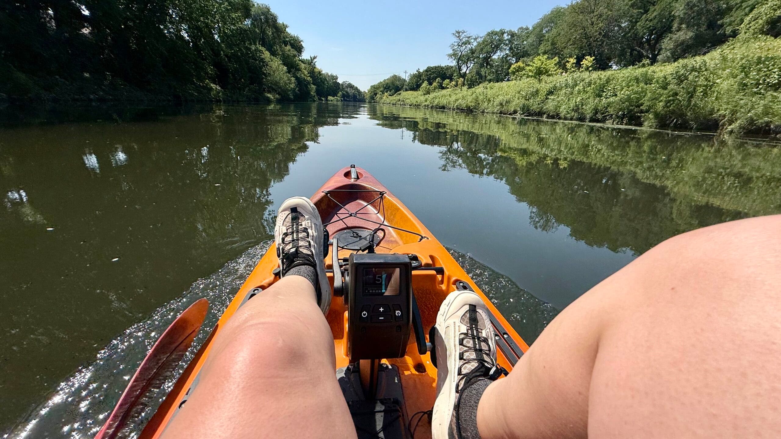Outside tester paddles an Old Town e-kayak down the North Branch of the Chicago River.