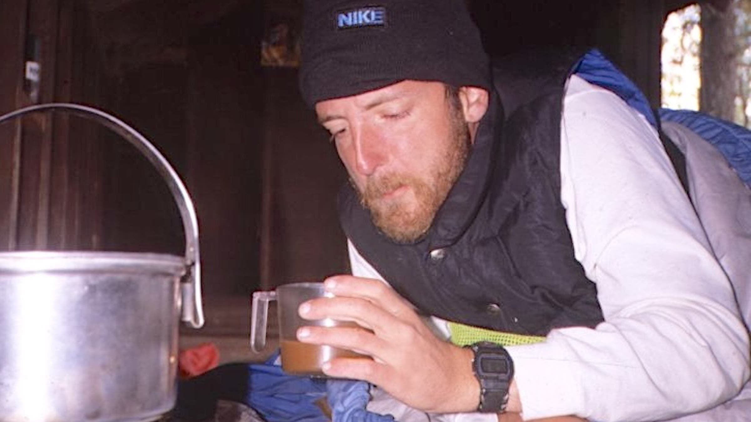 Swift downs a cold-weather breakfast in camp during his first AT hike.