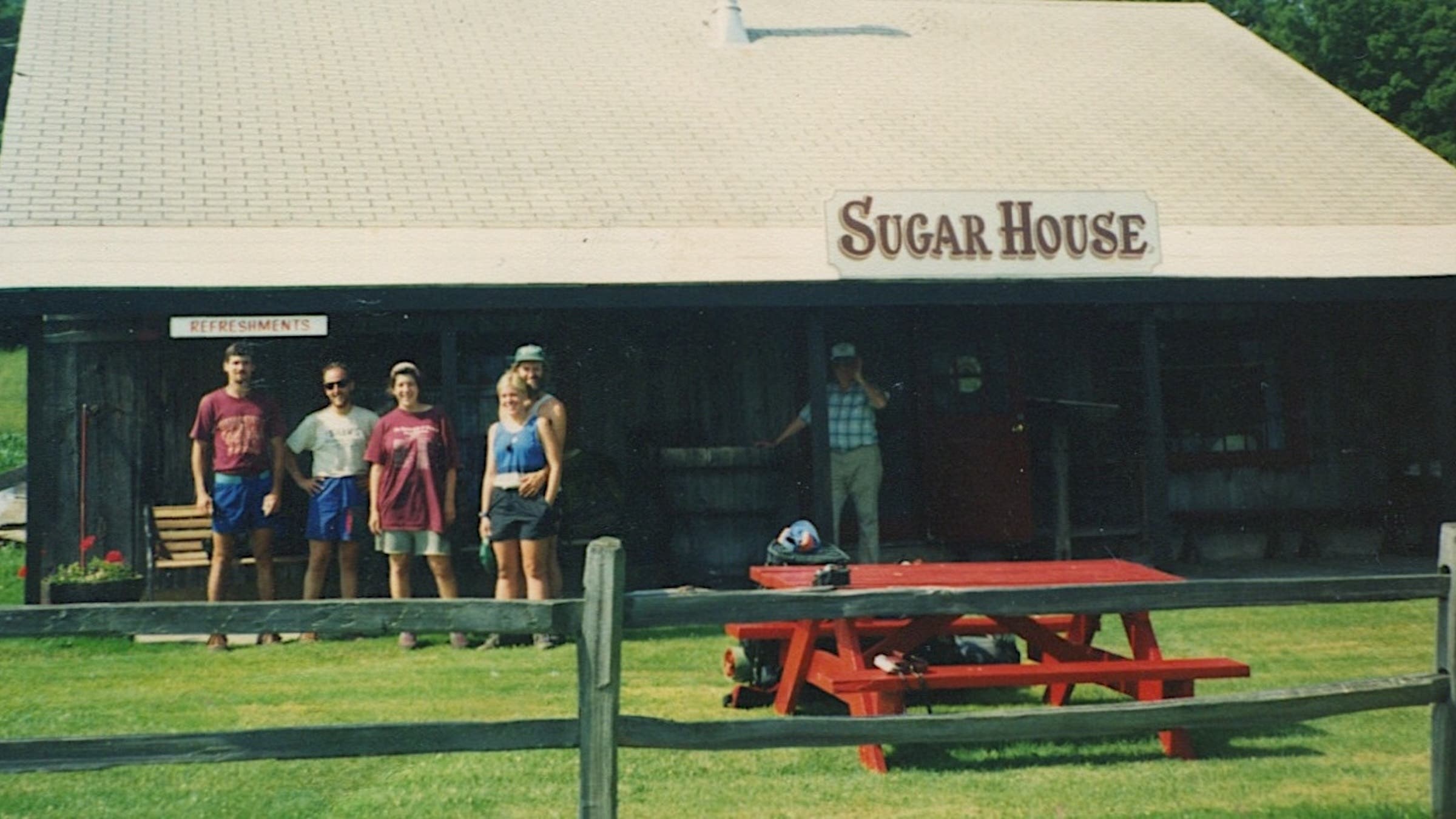 At New Hampshire’s Mount Cube Sugar House on the morning of July 22, 1990. From left: Greg “Animal” Hammer; the author; Chris; and Molly and Geoff. The restaurant’s owner, former Governor Meldrim Thomson Jr., watches off to the right.