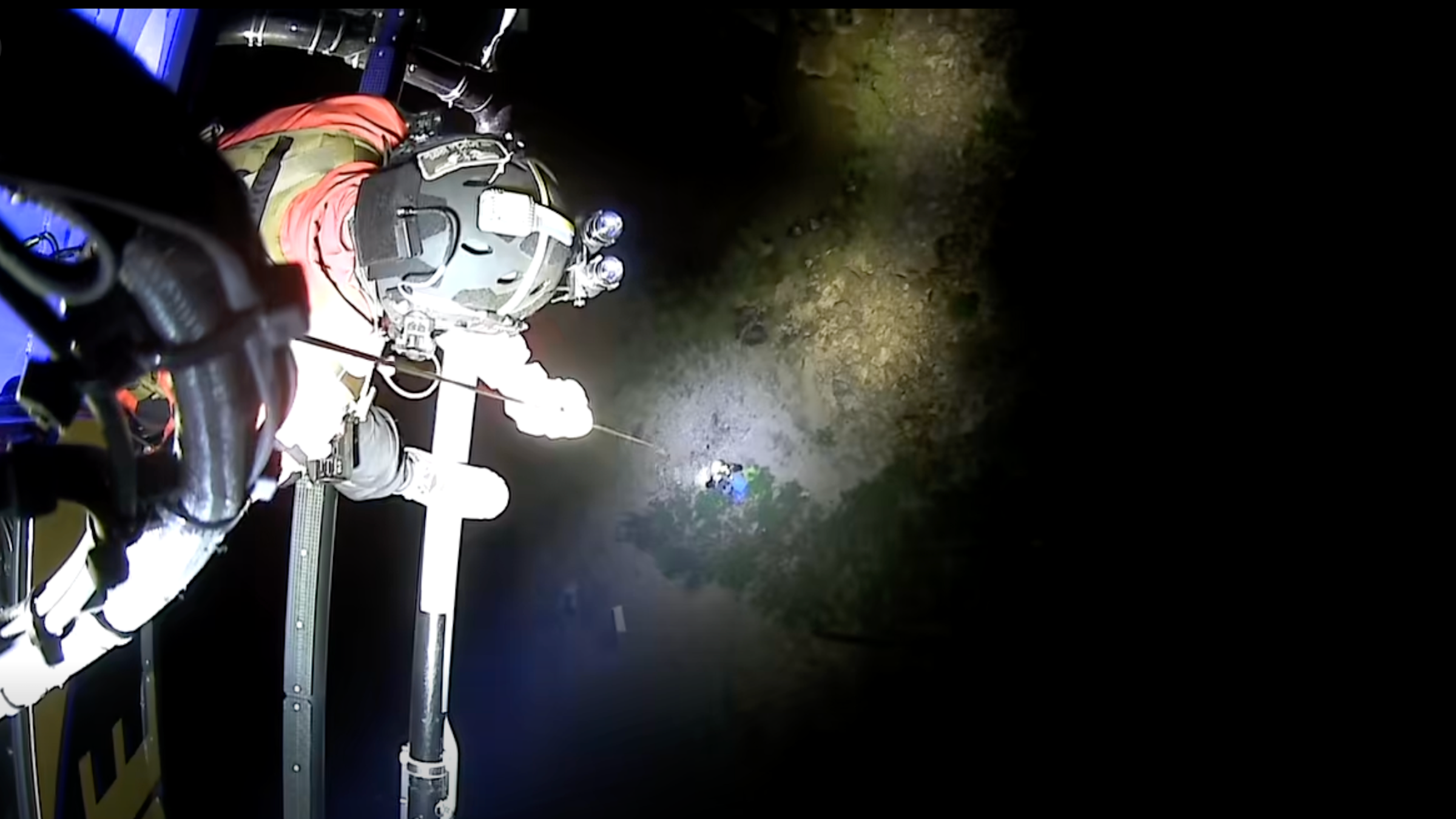 hoist rescue shown from the perspective of the helicopter