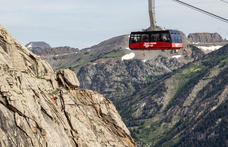 corbet's couloir via ferrata ascends directly under the aerial tram line