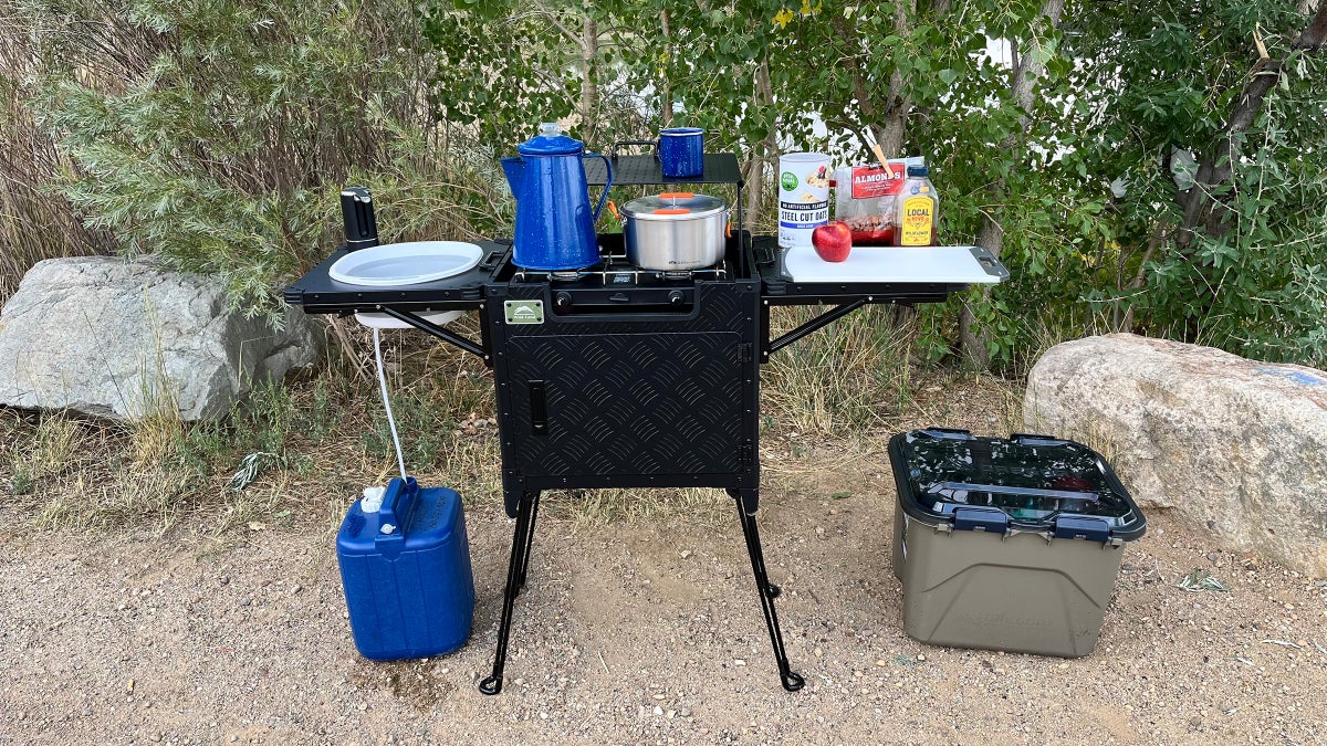 This All-In One Camp Kitchen Comes With Running Water at the Push of a Button