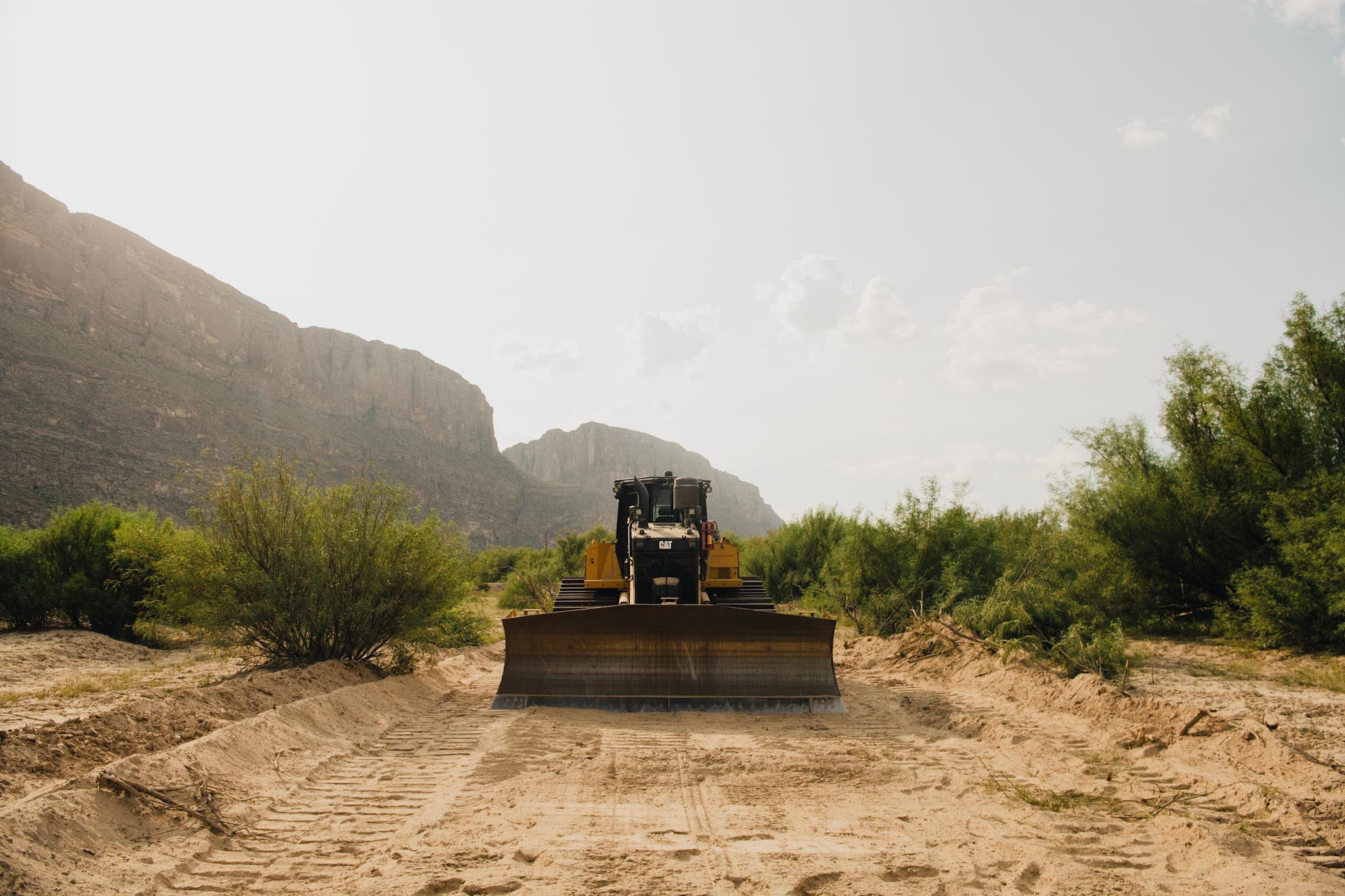 a bulldozer pictured clearing ground near Big Bend National Park