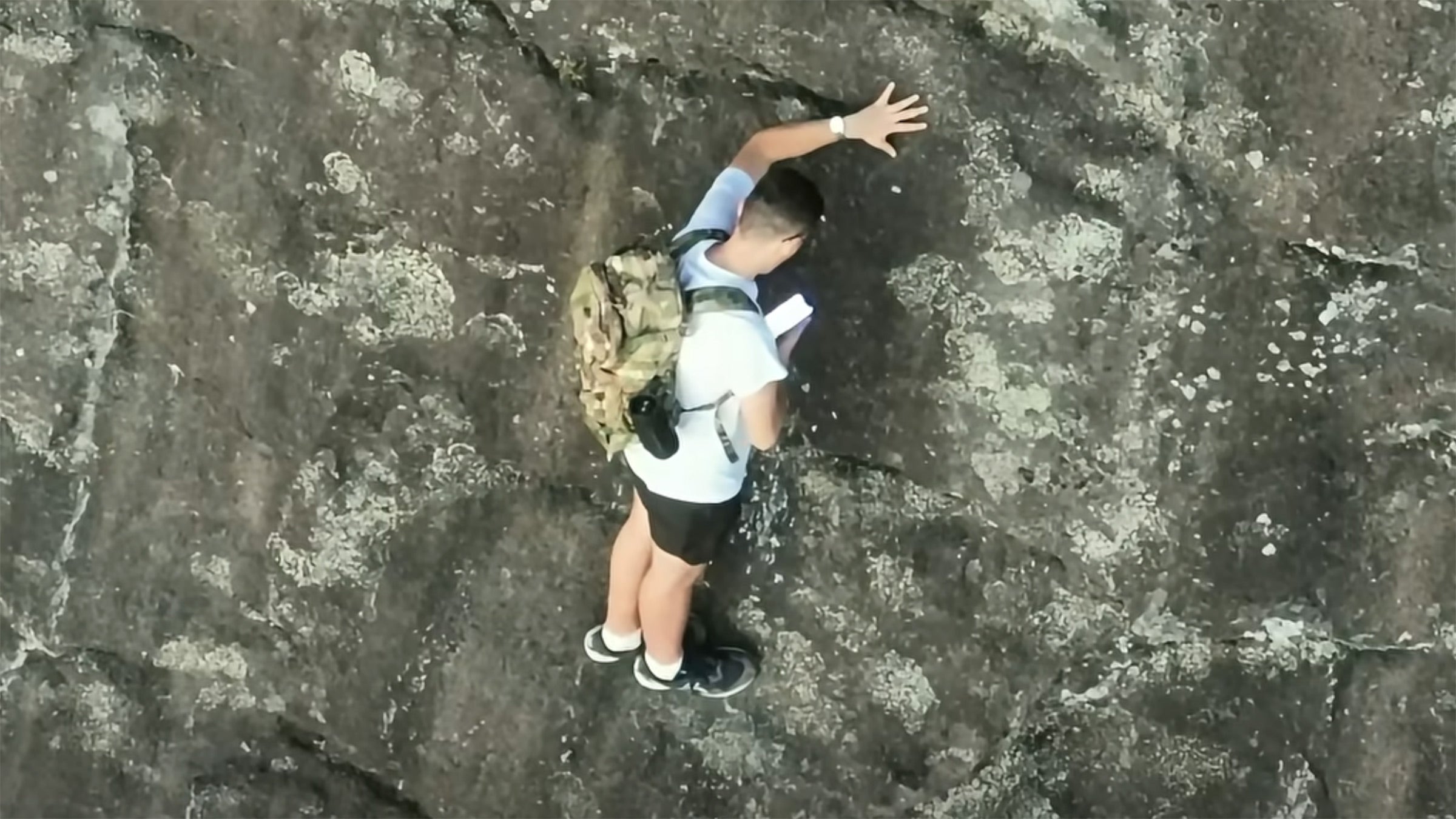 A screengrab from the drone footage of a rescue on Mount Yonah